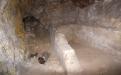 A half-destroyed bone chamber in St. Nestor branch of the Near Caves